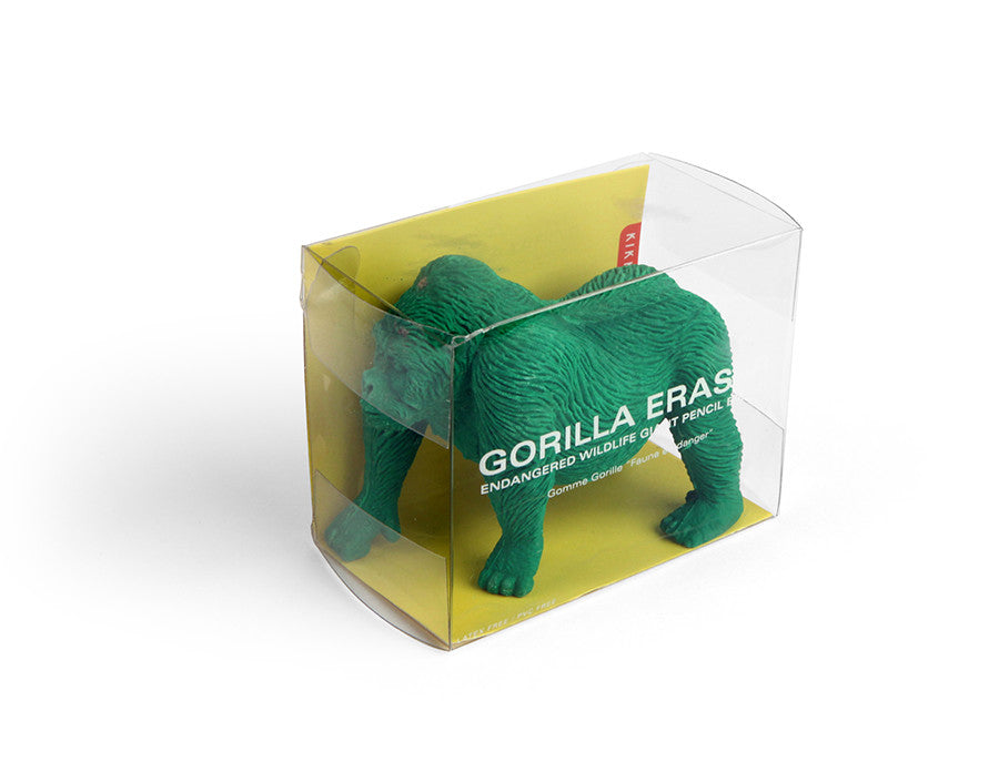 a green rubber gorilla in packaging